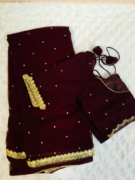 AK003 -Pure georgette saree with handwork cutdana bprder. Comes with stitched blouse size 38, can be altered to size 42