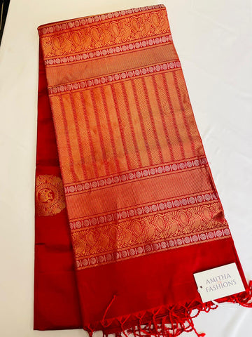 Pure Kanjivaram Handloom Soft Silk saree in Crimson Red w/ Zari Chakram Motifs and Buttas. Comes w/ Zari Pallu and Matching Blouse