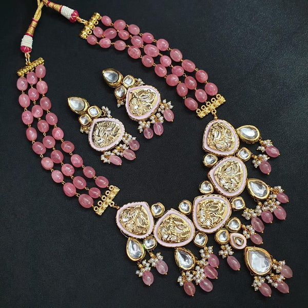 JP526 - Kundan Necklace with ruby beads. comes with matching earrings.