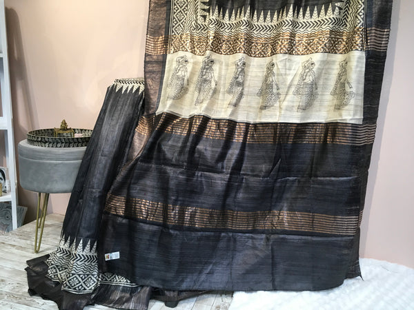 KSP212 - pure zari tussar saree in black with white border.Comes with stitched blouse size 38,can be altered to 42