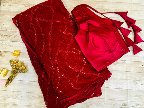 AM302 - Imported sequin saree in maroon color. Comes with stitched blouse size 38, can be altered to size 42