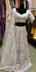 AFL4003 Wedding lehenga in lavender with heavy embroidery and sequin work.comes with stitched blouse and net dupatta.