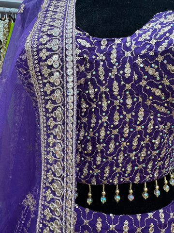 AFL2017- Purple golden heavy work lehenga with net dupatta