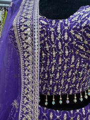 AFL2017- Purple golden heavy work lehenga with net dupatta