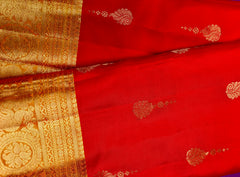 KSS410 Pure handloom kanchipuram silk Saree in Orange with yellow gold zari border.comes with stitched blouse size 40,can be altered to 44 size.