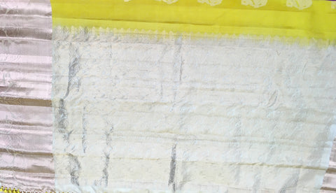 KSS461 Pure handloom kanchipuram silk Saree in yellow with white gold zari border.comes with stitched blouse size 40,can be altered to 44 size.