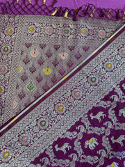 semi silk banarasi Saree in wine with Zari Border. Comes with stitched blouse size 38 can be altered up to 44