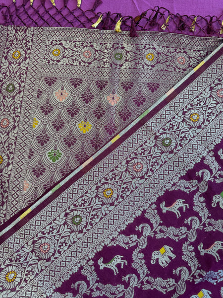 semi silk banarasi Saree in wine with Zari Border. Comess with stitched blouse size 38 can be altered up to 44