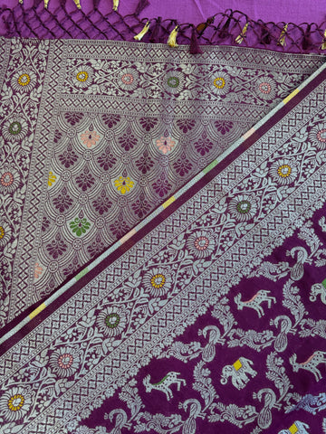semi silk banarasi Saree in wine with Zari Border. Comess with stitched blouse size 38 can be altered up to 44