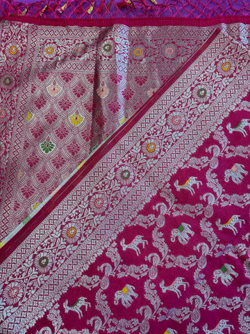 semi silk banarasi Saree in rani Pink with Zari Border. Comess with stitched blouse size 38 can be altered up to 44