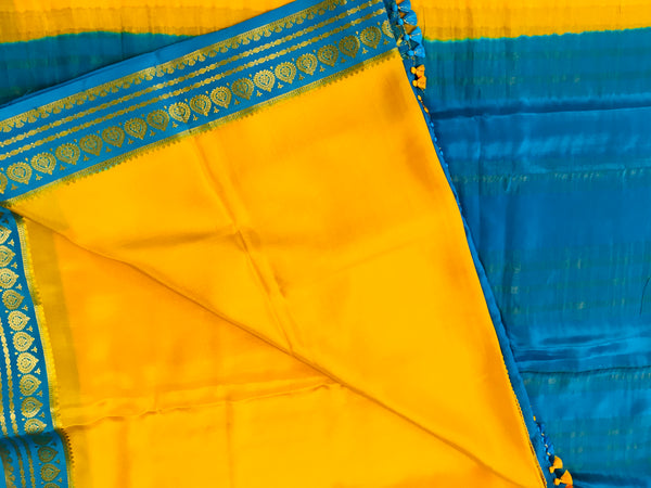 AMS1008 Pure Mysore Crepe silk Saree in yellow color with blue gold zair border. Comes with unstitched blouse.