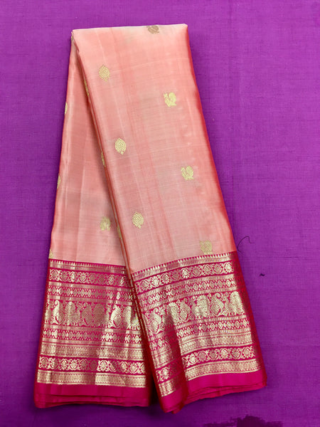 KSS453 Pure handloom kanchipuram silk Saree in pink with Rani pink gold zari border.comes with stitched blouse size 40,can be altered to 44 size.