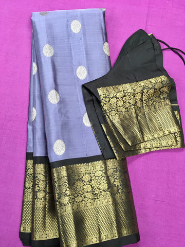KSS412 Pure handloom kanchipuram silk Saree in purple with brown gold zari border.comes with stitched blouse size 40,can be altered to 44 size.