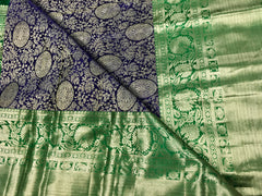 KSS507 Pure kanchipuram handloom silk Saree in purple with green color gold zari border. comes with stitched blouse size 40,can be altered to 44 size.