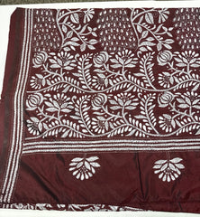 KSN209: Semi Silk Kantha Tusser Saree in maroon hand work design. Fall Peco done. Comes with stitched Blouse size 38 it can be altered to 44 size.