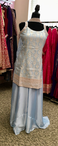 AFL2029- Banarasi silk suit come with gold Zaria work on top.Comes with sharara pant and necklace dupatta.