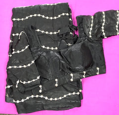 AFL3044 party wear saree in black soft fendy satin silk saree with beads embroidery work.Comes with stitched blouse size 40,can be altered to 44size.Fall peco done.