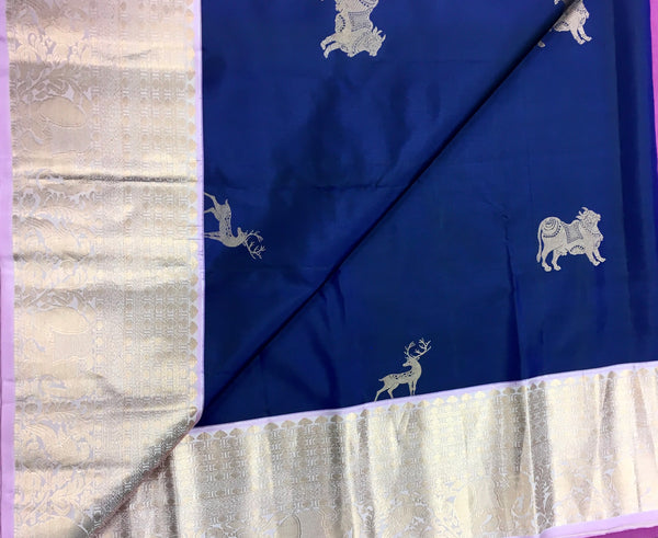 KSS459 Pure handloom kanchipuram silk Saree in blue with purple gold zari border.comes with stitched blouse size 40,can be altered to 44 size.