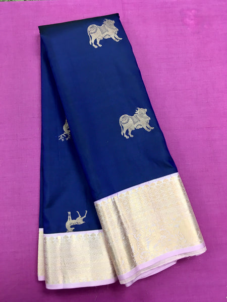 KSS459 Pure handloom kanchipuram silk Saree in blue with purple gold zari border.comes with stitched blouse size 40,can be altered to 44 size.
