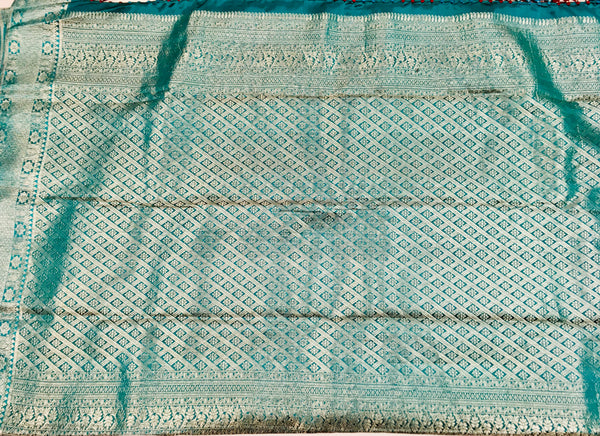 KSS508 Pure kanchipuram handloom silk Saree in maroon with teal color and silver zari border. comes with stitched blouse size 40,can be altered to 44 size.