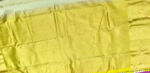 KSS456 Pure handloom kanchipuram silk Saree in sandal yellow with yellow gold zari border.comes with stitched blouse size 40,can be altered to 44 size.