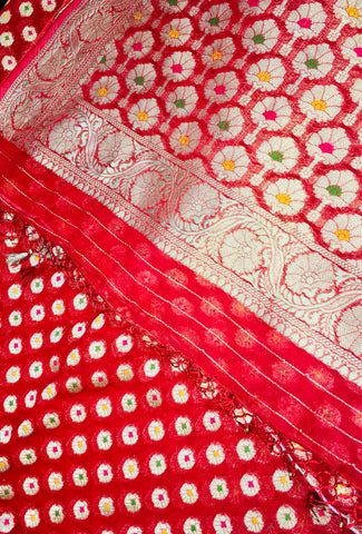 BKS102 Banarasi Georgette saree in red. Comes with stitched blouse size 38 can be altered to size 42. Fall peco done.