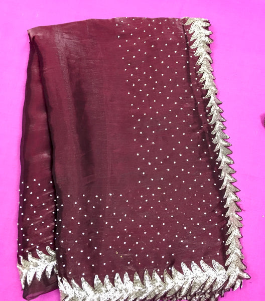 AFL3054 Partywear saree in wine with silver embroidery.Comes with stitched blouse size 40,can be altered to 44 size.Fall peco done.