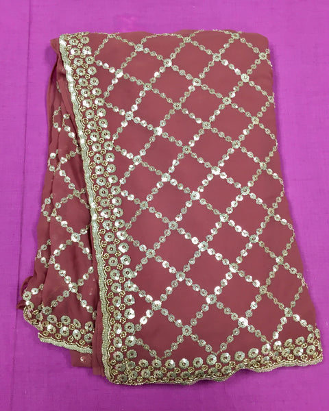 AFL3066 Partywear Saree in brown Georgette fabric with silver sequins embroidery.Comes with stitched blouse size 40,can be altered to 44 size.Fall peco done.