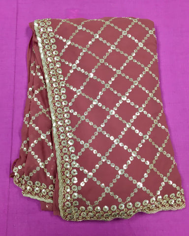 AFL3066 Partywear Saree in brown Georgette fabric with silver sequins embroidery.Comes with stitched blouse size 40,can be altered to 44 size.Fall peco done.