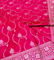 BKS123 Banarasi Mashru silk Saree in pink.Comes with gold zari work. Comes with stitched blouse size 38 can be altered to size 42. Fall peco done.