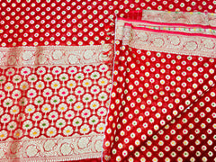 BKS102 Banarasi Georgette saree in red. Comes with stitched blouse size 38 can be altered to size 42. Fall peco done.