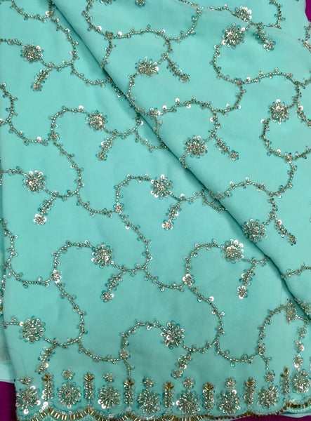 AFL3060 Partywear saree in blue with sequins and bead work.Come with stitched blouse size 40,can be altered to 44 size.Fall peco done.