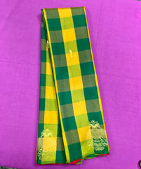 KSS427 Pure handloom kanchipuram silk Saree in green and yellow checkered with gold zari.comes with stitched blouse size 40,can be altered to 44 size.