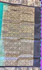 Pure kanchipuram Handloom Silk Saree in Blue with Brown Zari border. Comes with Stitched Blouse size 38 can be altered up to 44
