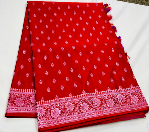 BKS116 Banarasi Mashru silk Saree in red.Comes with gold zari work. Comes with stitched blouse size 38 can be altered to size 42. Fall peco done.