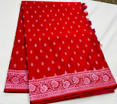 BKS116 Banarasi Mashru silk Saree in red.Comes with gold zari work. Comes with stitched blouse size 38 can be altered to size 42. Fall peco done.