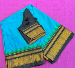 Korvai silk cotton saree in Blue with black border. Fall peco done. Comes with stitched blouse size 38 can be altered up to 44 size.