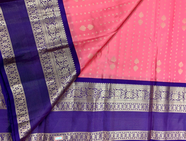 KSS430 Pure handloom kanchipuram silk Saree in pink with purple gold zari border.comes with stitched blouse size 40,can be altered to 44 size.