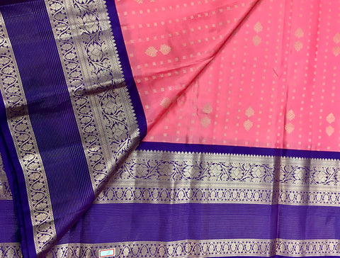 KSS430 Pure handloom kanchipuram silk Saree in pink with purple gold zari border.comes with stitched blouse size 40,can be altered to 44 size.