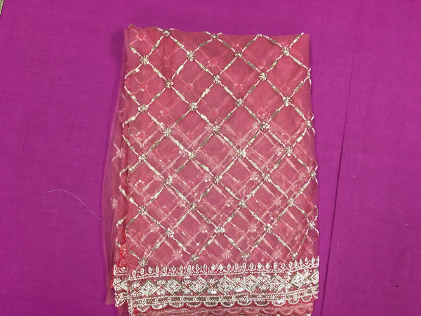 AFL3070 Partywear net saree in pink with silver bead and sequin embroidery.Comes with stitched blouse size 40,can be altered to 44 size.Fall peco done.