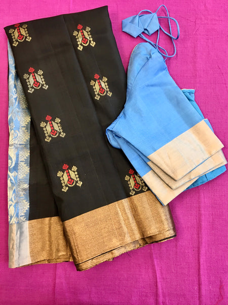 Pure kanchipuram Handloom Soft  Silk Saree in Black with blue  Zari border. Comess with Stitched Blouse size 38 can be altered up to 44