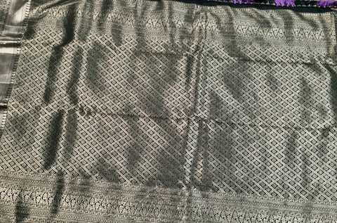 KSS506 - Pure kanchipuram tissue silk Saree in purple color with bottle green color gold zari border. comes with stitched blouse size 40,can be altered to 44 size.