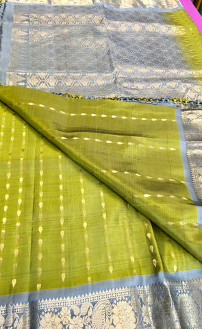 Pure kanchipuram Handloom  silk Saree in Green with Gray border. Comes with stitched blouse size 38 can be altered up to 44 size.