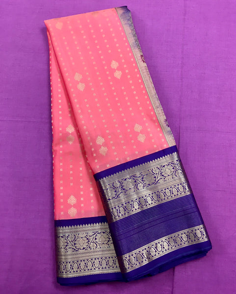 KSS430 Pure handloom kanchipuram silk Saree in pink with purple gold zari border.comes with stitched blouse size 40,can be altered to 44 size.