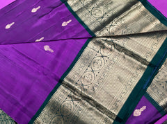 KSS411 Pure kanchipuram silk Saree in purple and green gold zari border.comes with stitched blouse size 40,can be altered to size 44.Fall peco done.
