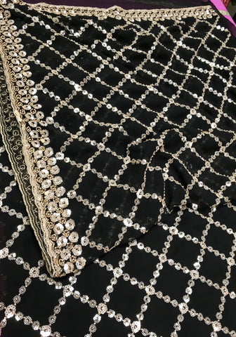 AFL3067 Partywear saree in black Georgette fabric with silver sequins embroidery.Come with stitched blouse size 40,can be altered to 44 size.Fall peco done.