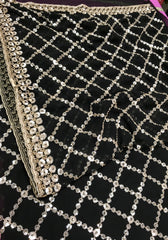 AFL3067 Partywear saree in black Georgette fabric with silver sequins embroidery.Come with stitched blouse size 40,can be altered to 44 size.Fall peco done.