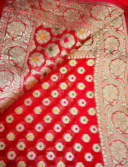 BKS102 Banarasi Georgette saree in red. Comes with stitched blouse size 38 can be altered to size 42. Fall peco done.