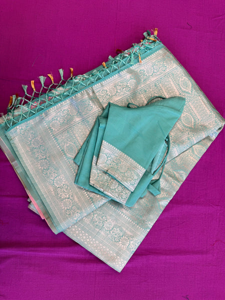 Banarasi Tussari  saree in Blue with Gold  zari border. Fall peco done. Comes with stitched blouse size 38 can be altered up to 44 size.