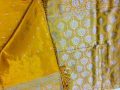 BKS117 Banarasi Mashru silk Saree in yellow. Comes with gold zari work. Comes with stitched blouse size 38 can be altered to size 42. Fall peco done.